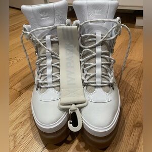 White Adidas x IVY PARK Icy Park platform sneaker boots.